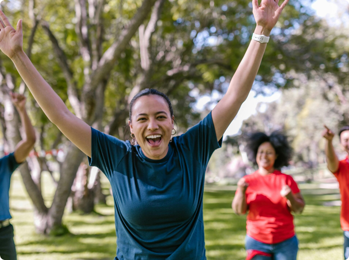 Person celebrating in park